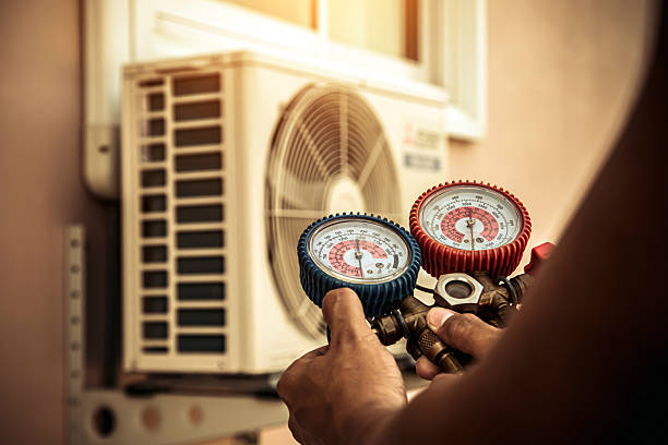 Professional Hvac Maintenance technician working in Woodville, MA